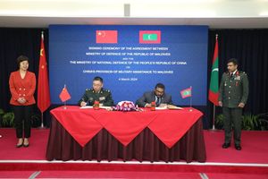 ޗައިނާއާއެކު، އަސްކަރީ އެހީގެ އެއްބަސްވުމެއްގައި ސޮއިކޮށްފި