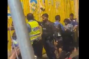 Three arrested for threatening police officers with knives