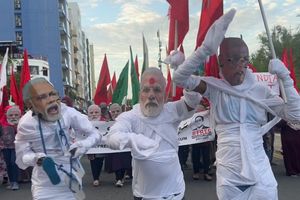 Government condemns opposition use of Modi masks as "disrespectful act"