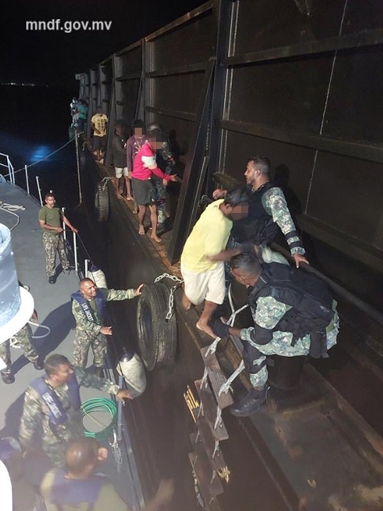 Coast Guard rescues 12 people stranded on a barge